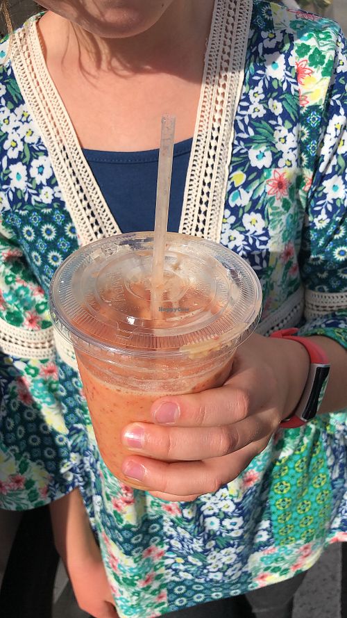 Small $3 Smoothie with passion fruit juice. Yummy at Da Spot in Honolulu