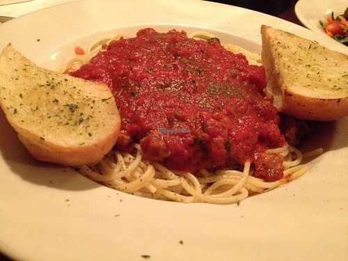 spaghetti w/ vegan soy sausage, served w/ vegan garlic bread  at Pizza Heaven Bistro in Phoenix