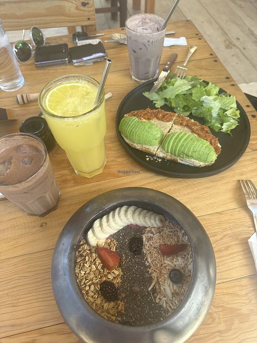 Avo toast with hummus and tomato salsa and the red fruit smoothie bowl.   at Romero in Huatulco