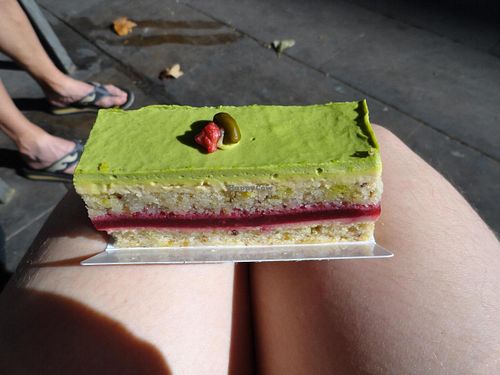 Supreme with pistachios and raspberries at Pasteleria La Estrella Cake Shop in Barcelona
