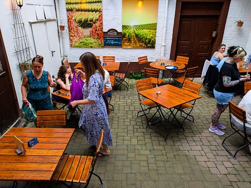Outdoor courtyard seating at Weinstube Eulenspiegel at Weinstube Eulenspiegel in Speyer