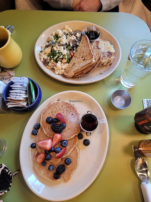 Vegan bliss pancakes and tofu scramble with sourdough and hashbrowns at Snooze in Atlanta