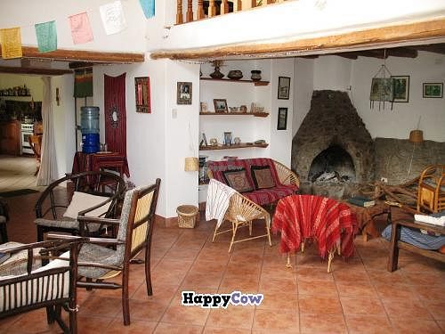 The  lounge with the fire place at Andean Spirit Lodge in Cusco
