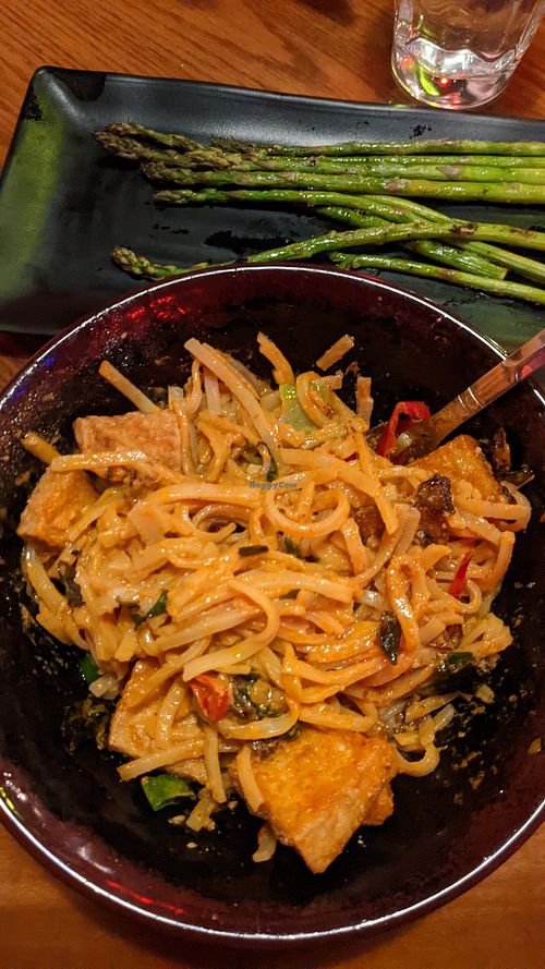 Red Curry Noodle Bowl - Ate like comfort food. And $6 worth of asparagus above it. at Swaylo's Tiki Restaurant & Bar in Longmont