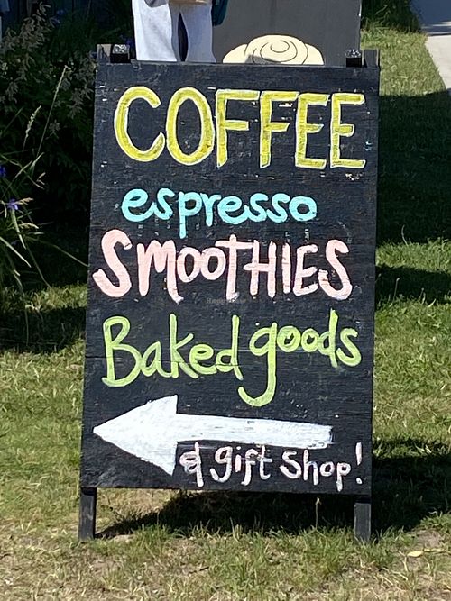 Signs on road  at The Dream Bean Machine in Grand Marais