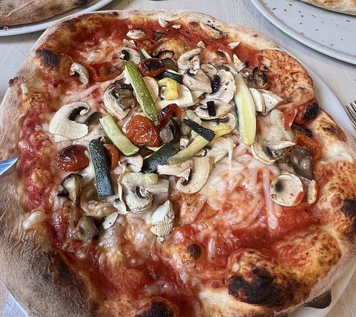 Pick your ingredients for the vegan pizza😄 at Gusto in Ystad