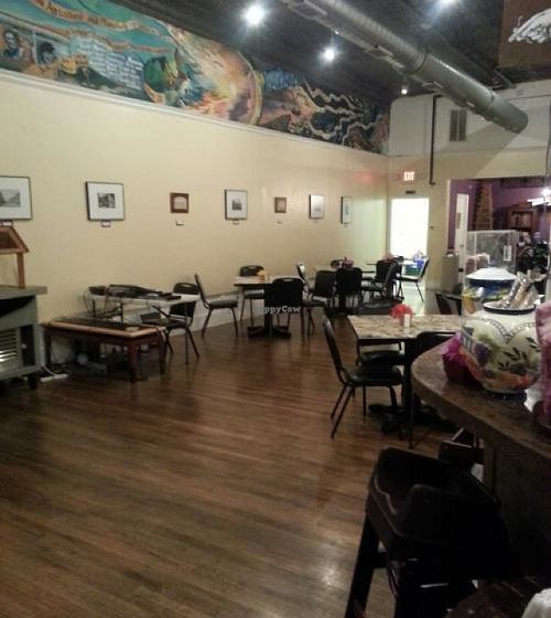 View of side and back seating area. at Downtown Central Perk in Davenport