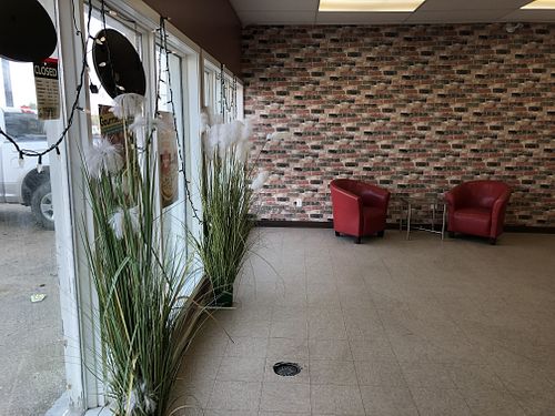 Chairs available for waiting   at Red Swan Pizza in Regina