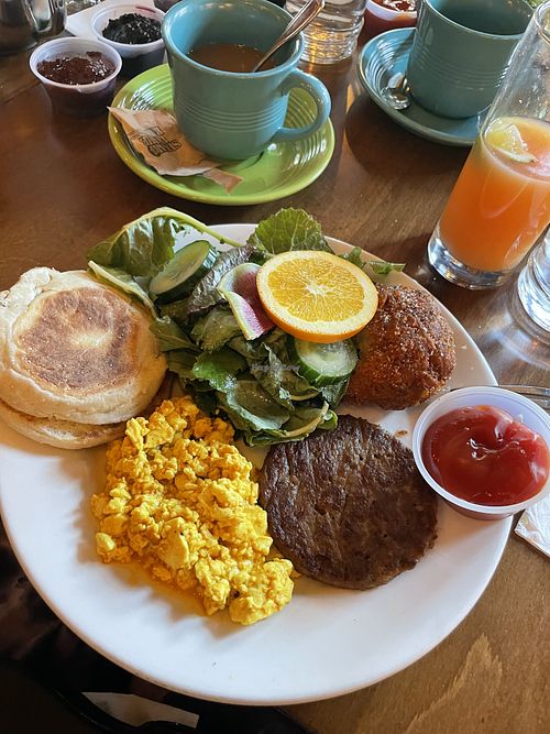 Breakfast platter-plant-based vegan option- scramble and vegan sausage with a unique hash brown and fresh squeeze grapefruit juice  at Pearl Moon in Woodstock