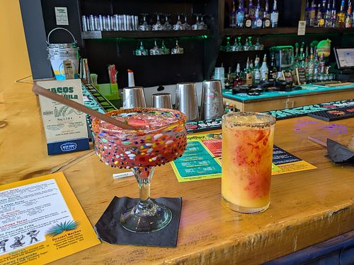 Strawberry and jalapeno marg and mango habanero marg with a raspberry drizzle at Lupe's 55 Cantina Mexican Grill in Hampton