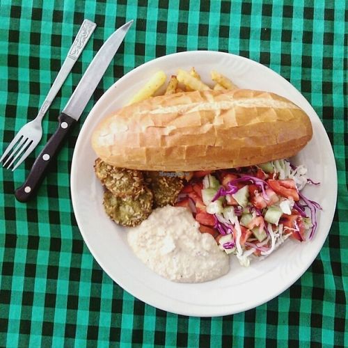 falafel with hummus, french fries, baguette and salad with lime.  at Veggie Tables in Vang Vieng