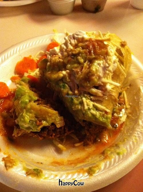 Chimichanga with soy-rizo filling, vegan sour cream, and vegan cheese at El Azteca Mexican Taco Shop in Provo