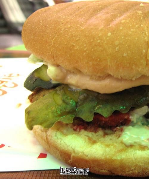 The veggie burger. Gherkins, hummus, tomato + lettuce on top of what appears to be a giant flat falafel. Really good. at Falafel Veggie in Istanbul