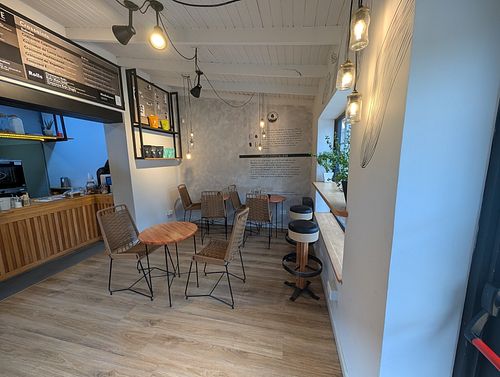 Inside seating at Club E Café de Especialidad in Esquel