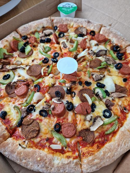The vegan works at Papa John's in Slough