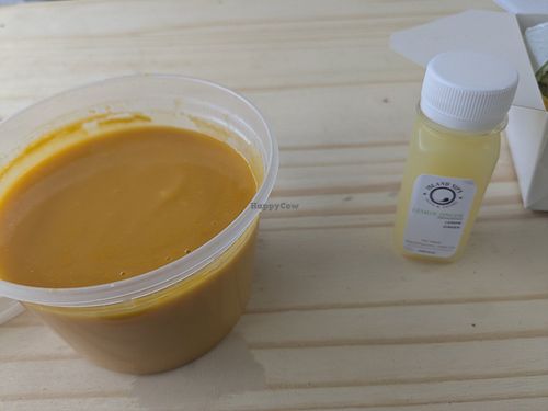 Ginger sweet potato soup + wellness shot at Island Sips Juice & Salads in Lauderhill