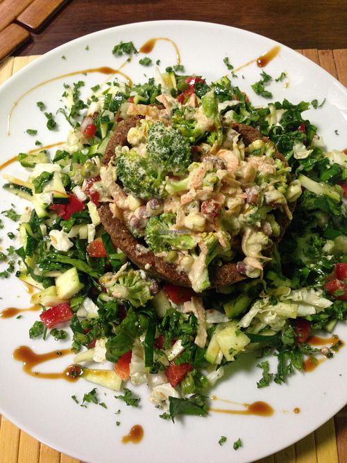 Raw mini pizza basket with veggie salad at BEMBA rawfood & plant-based in Bratislava