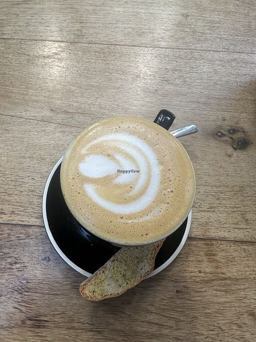 Vegan Almond Coffee (not sure about the Cookie)   at Brooks Cafe & Deli Vic Falls in Victoria Falls