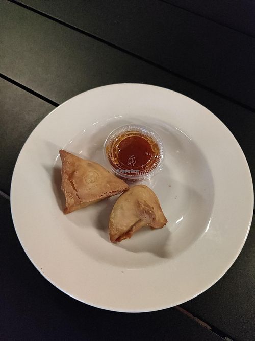 Veggie samosas with mango chili sauce at Tandoori Pizza & Wing Co - PR in Atlanta