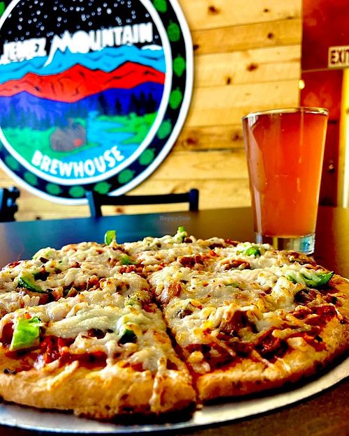 Vegan Pie with gluten-free cauliflower crust. Blood Orange Cider at Jemez Mountain Brewhouse in Jemez Springs