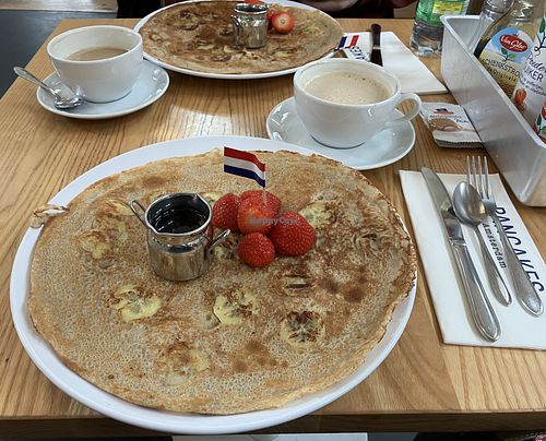 Banana pancakes with strawberries   at Pancakes - Westermarkt in Amsterdam