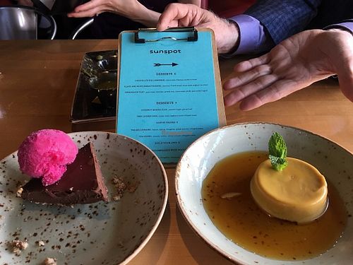 Chocolate Tart with Prickly Pear Sorbet  &  Coconut Mango Flan with caramel.  Both were very delicious!

 at Sunspot in Knoxville