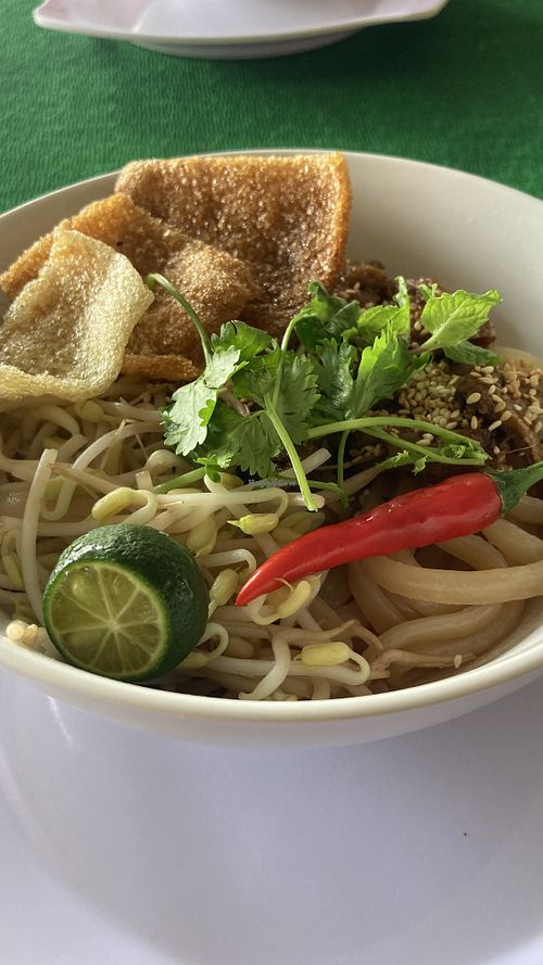 Cau lau😍 comes with some sauce and greens on the side  at Quan An Lạc Vegetarian Food in Quang Nam