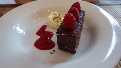 Dark Chocolate and Raspberry Mud Pie with clotted cream and raspberry coulis at The Bean Inn in St Ives