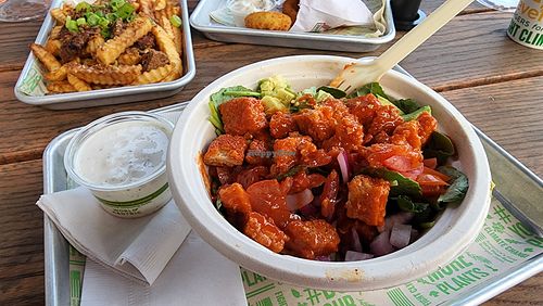 cluckcobb on kale with buffalo chikn and blue cheese. good.  at Next Level Veggie Grill in Denver