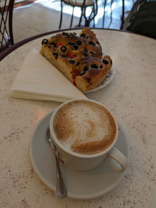 Sourdough Focaccia  and "meia de leite" (half-milk coffee) at Belo Farelo in Porto