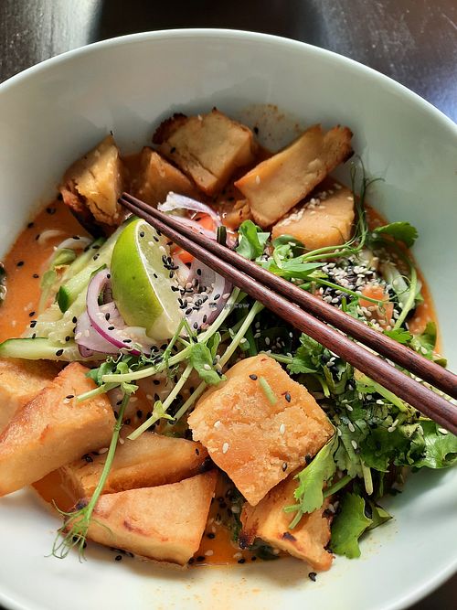 Khao soi with flat noodles and chickpea tofu at Peace kitchen in Helsinki