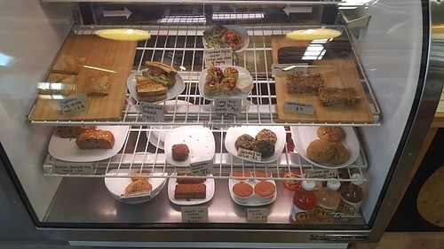 Uprooted Kitchen's cold case filled with yummy treats! Many of them are Wheat Free! at The Uprooted Kitchen in Gilbert