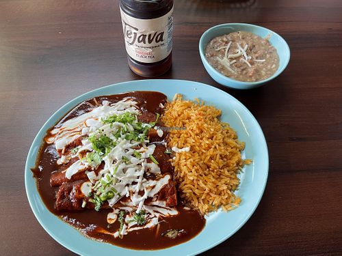 3 vegetable burritos with pinto beans  at El Cantaro Vegan Taqueria in Sacramento