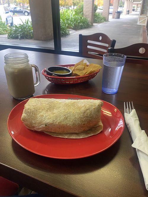 Vegan Asada Burrito, Horchata, Chips, and Water 😋  at El Cantaro Vegan Taqueria in Sacramento