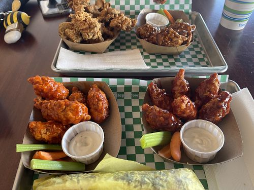 Assortment of wings, BBQ, Buffalo and teriyaki along with some fried oyster mushrooms  at Happy Vegan in Fountain Valley