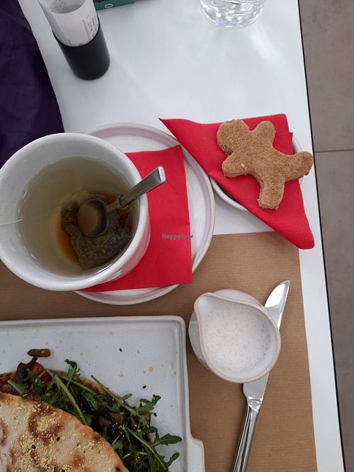 Brew-your-own herbal tea, almond milk and complimentary ginger shortbread person at Anthema - Central in Athens