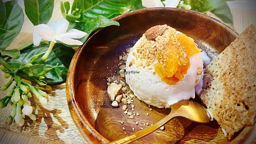 homemade vanilla coconut icre cream topping with homemade pineapple jam and cone so delicious  at Loving Hut Diệp Lâm Vegan in Ho Chi Minh City