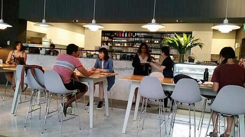 dining area with kitchen in the background at Real Food 真食 - Orchard in Central Singapore