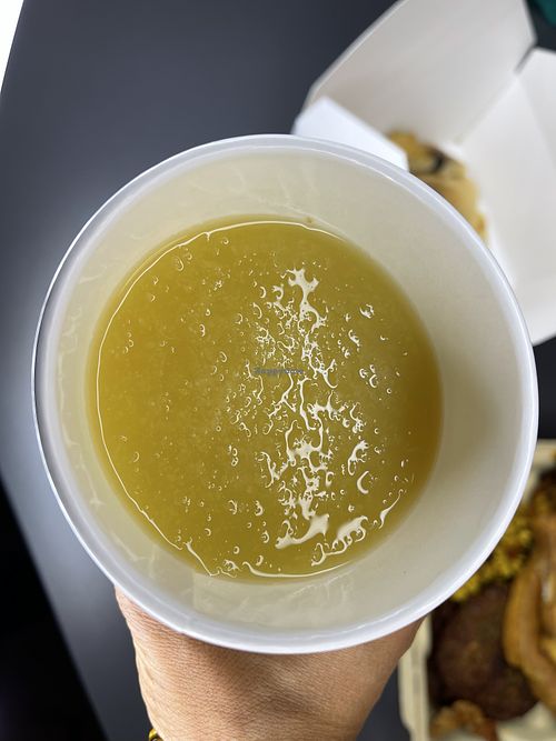 Fresh pineapple orange ginger juice   at Adina's Vegan Cuisine in St Louis