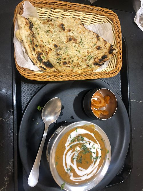 Butter and Garlic Naan, and Chiken Tikka Masala at PRATIDINAM in Karnataka