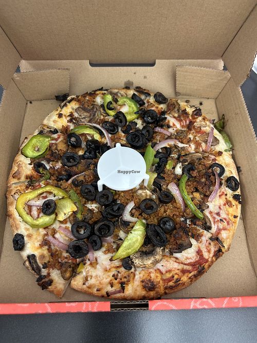 Personal with vegan cheese, veggies, and vegan sausage - very good and reasonably priced.   at Delish Pizza in Sacramento