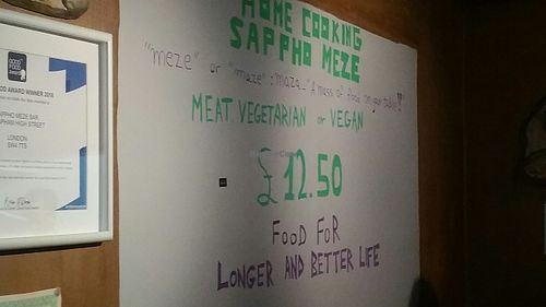 Signage at Sappho Meze in South West London