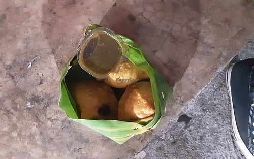 Samosa take away in biodegradable banana leaf. at Hommie Samosas  - Pai in Pai
