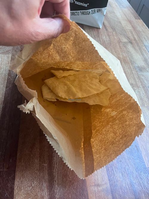 Absolutely appalling experience.

We placed a £54 order using the 2-for-1 offer, only to discover that “2-for-1” appears to mean splitting a single portion between two conta at Nazmin's in South West London