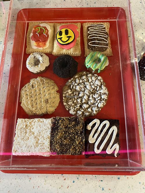Astrotarts and Mini Donuts (Display Case)  at Cosmic Bakery  in Upland