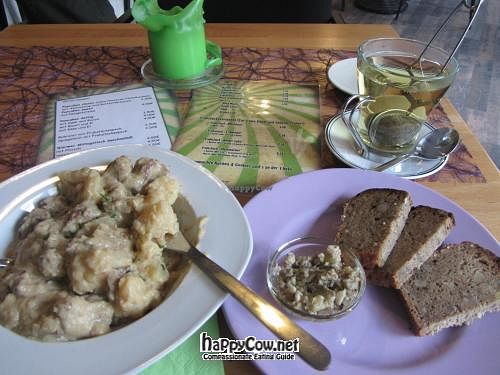Seitan stir-fry with nut bread and eggplant and almond pesto at Cafe Knorke in Saarbrucken