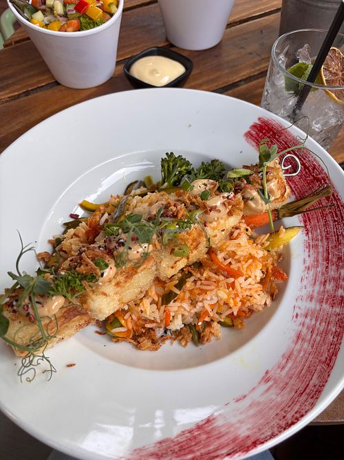 Saté van gepofte knolselderij met rijst en kimchi at Eetcafé het Leven in Leeuwarden
