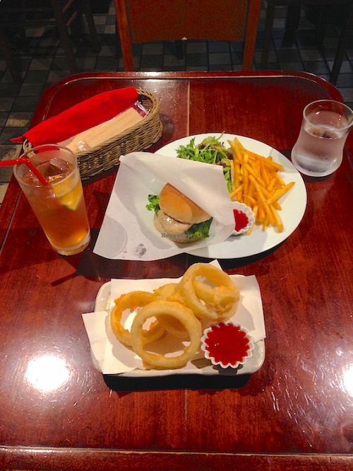 Onion rings, the Kyoto Miso Katsu burger with salad and fries, and a too-sweet-for-my-teeth housemate ginger ale.  at Matsuontoko Cafe in Kyoto