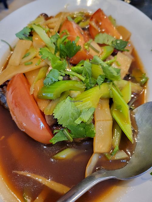 Vegggie fish and tomato sauce at Quan Yin in Houston