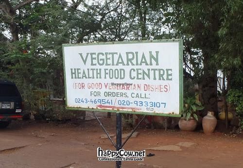 The sign for it off the road, keep an eye out for it! at Pat's Vegetarian Health Food Center in Accra